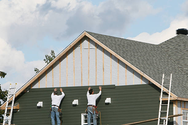 Professional Emergency Siding Repair technician working in Long Beach, NY